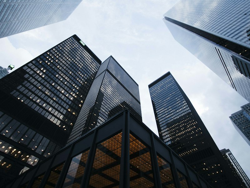 City skyline of office buildings — multi-location growth